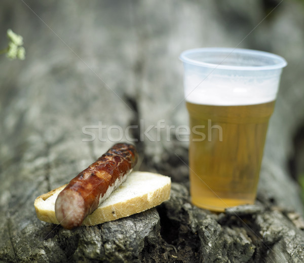 grilled sausage with beer Stock photo © phbcz