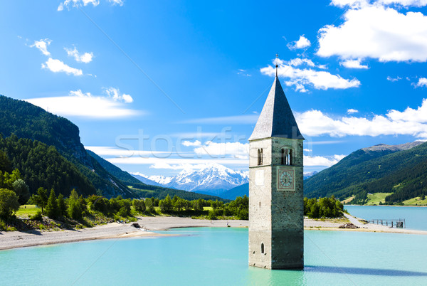 tower of sunken church in Resia lake, South Tyrol, Italy Stock photo © phbcz