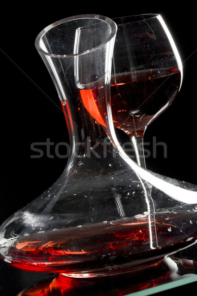 wine glass and carafe with red wine Stock photo © phbcz