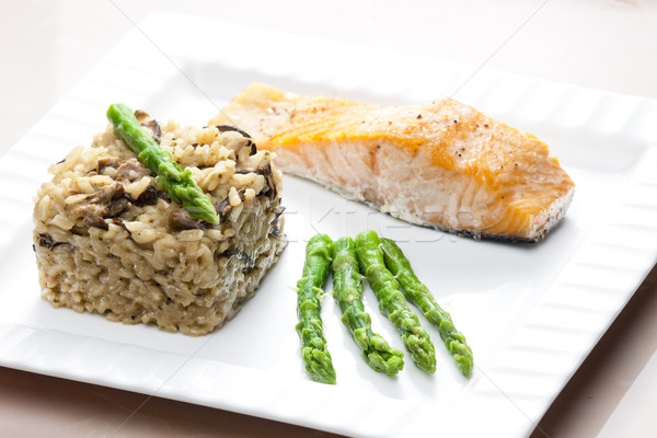 baked salmon with mushroom risotto and green asparagus Stock photo © phbcz