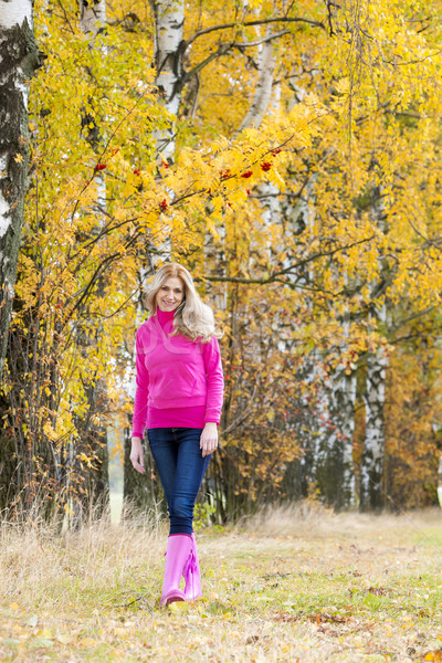 woman wearing rubber boots in autumnal nature Stock photo © phbcz
