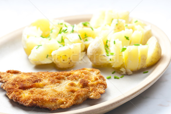 Sült disznóhús filé főtt krumpli tányér Stock fotó © phbcz