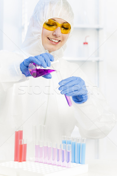 young woman wearing protective coat in laboratory Stock photo © phbcz