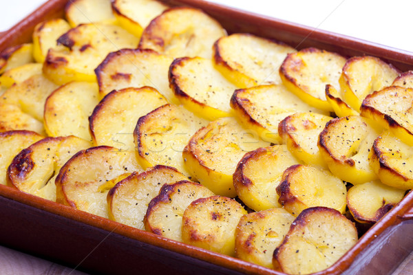 potatoes baked with pork minced meat and red cabbage Stock photo © phbcz