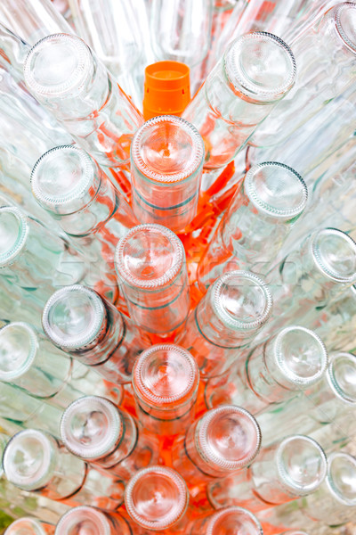 empty bottles of wine on rack Stock photo © phbcz