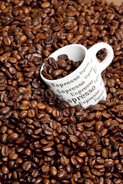 cup of coffee with coffee beans Stock photo © phbcz
