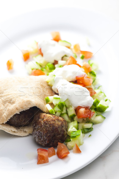 meatball in pan pita with tomato and cucumber salad Stock photo © phbcz