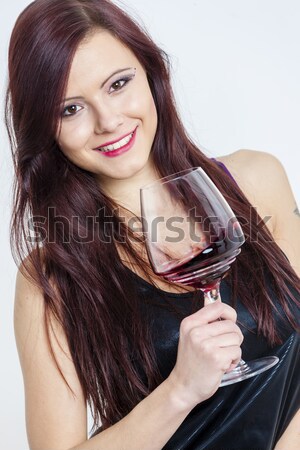 portrait of young woman with a glass of red wine Stock photo © phbcz