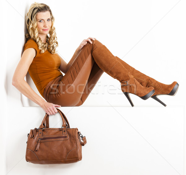 Séance femme brun vêtements bottes [[stock_photo]] © phbcz