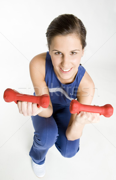 woman exercising with dumb bells Stock photo © phbcz