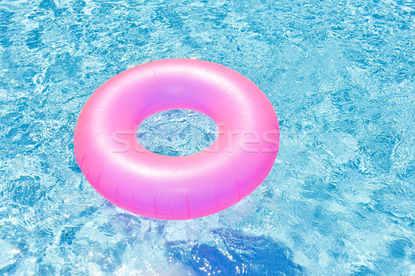 Rosa Gummi Ring Schwimmbad Wasser Sommer Stock foto © phbcz