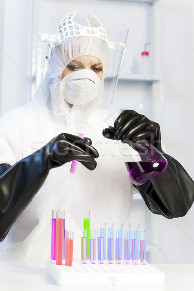 young woman wearing protective clothes in laboratory Stock photo © phbcz