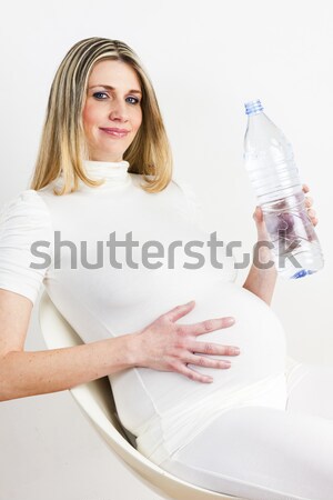 portrait of standing pregnant woman wearing lingerie Stock photo © phbcz