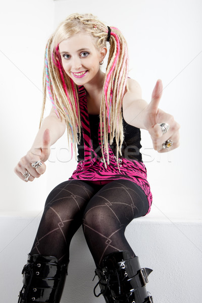 sitting young woman with dreadlocks Stock photo © phbcz