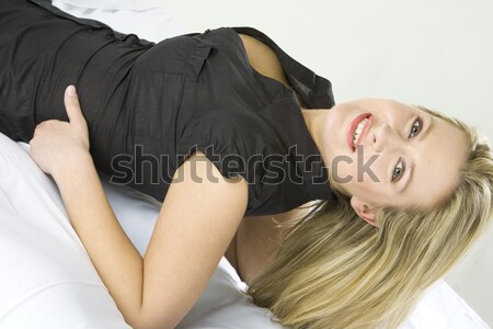 portrat of lying woman Stock photo © phbcz