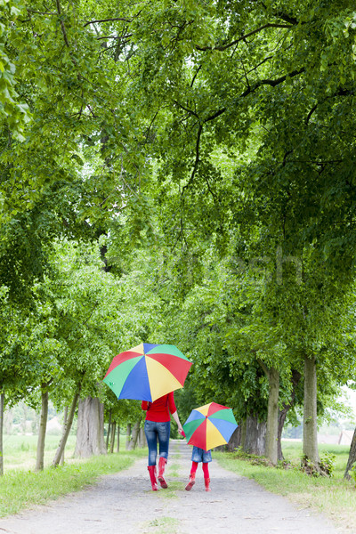 Moeder dochter parasols voorjaar steegje vrouw Stockfoto © phbcz