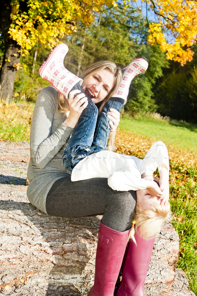 mother with her little daughter in autumnal nature Stock photo © phbcz