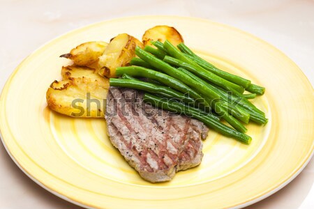 Biftek taze fasulye sarımsak patates plaka bıçak Stok fotoğraf © phbcz