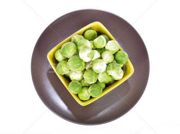 Stock photo: Brussels sprouts in a brown plate 