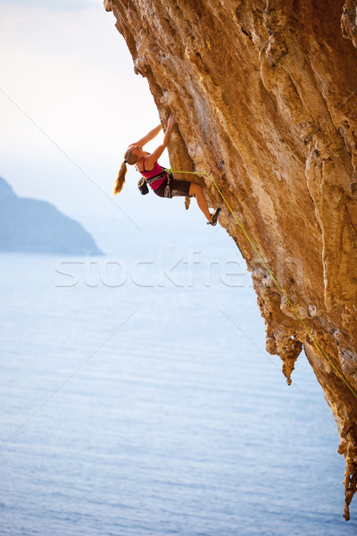 Family rock climber at sunset. Stock photo © photobac