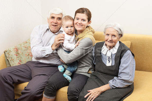 Négy generáció család ül kanapé otthon Stock fotó © photobac