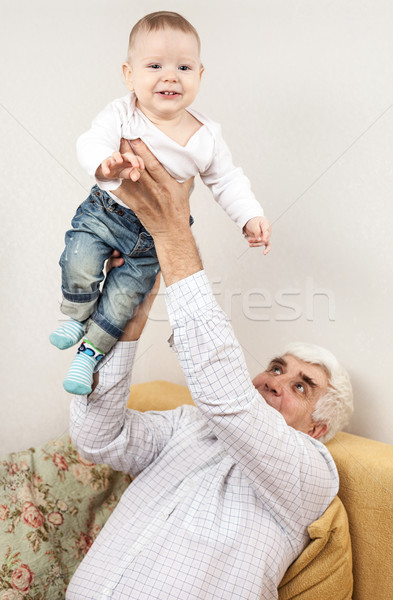 Grand-père petit-fils séance canapé heureux [[stock_photo]] © photobac