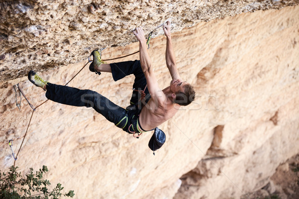 Rock climber on a face of a cliff Stock photo © photobac