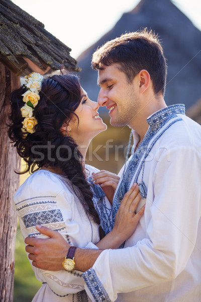 Young couple in Ukrainian style clothes outdoors Stock photo © photobac