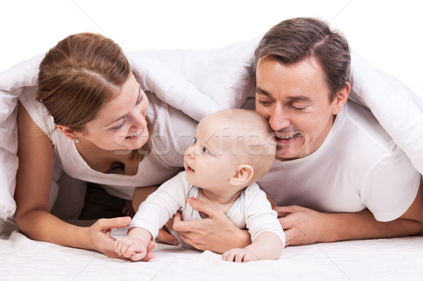 Stock photo: Young family with baby boy over white background