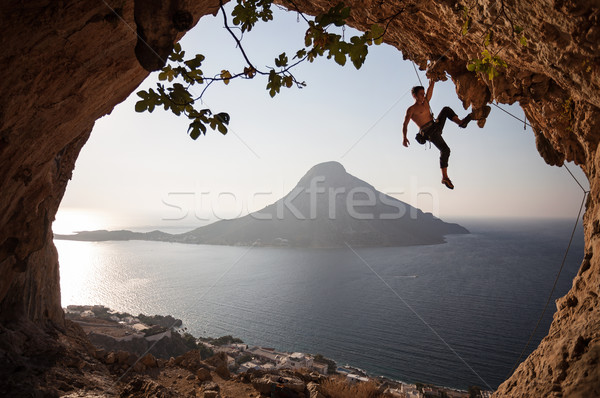 Rock climber at sunset Stock photo © photobac