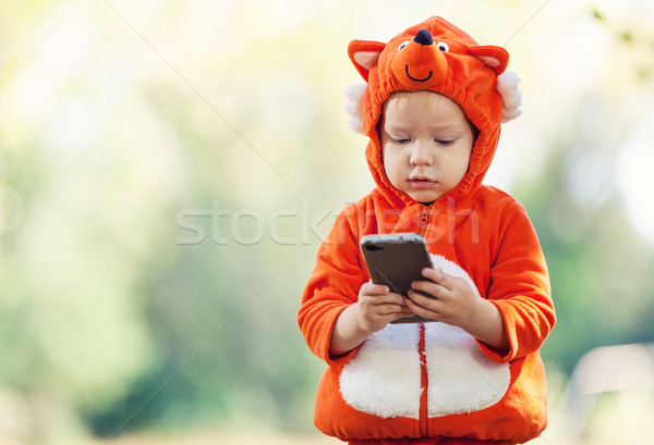 Jongen vos kostuum smartphone Stockfoto © photobac