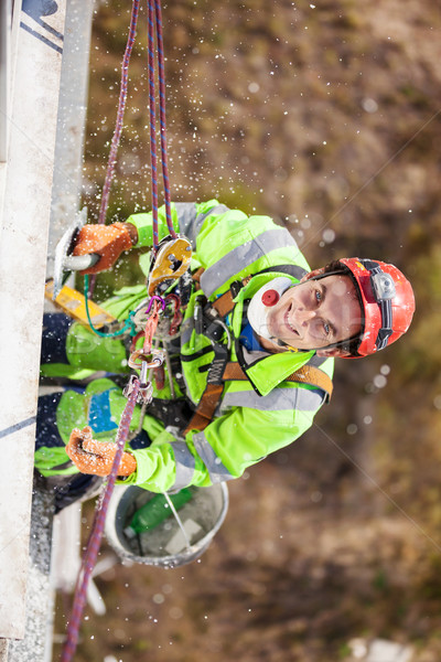 Industrial climber during winterization works Stock photo © photobac