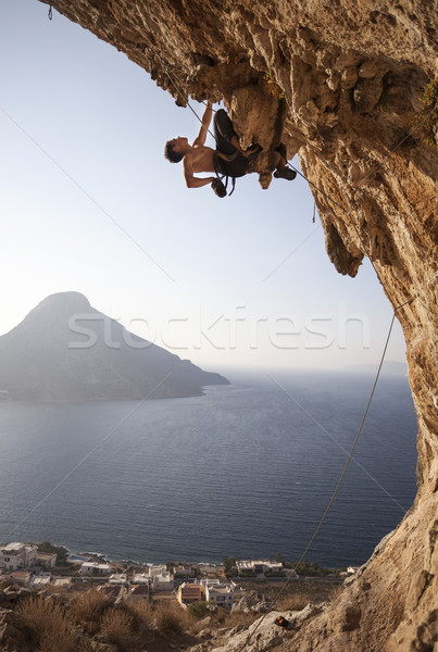 Rock climber at sunset Stock photo © photobac