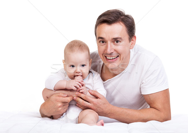 Young Caucasian father with baby son over white Stock photo © photobac