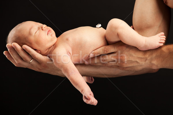Nou-nascut băiat arme negru familie Imagine de stoc © photobac