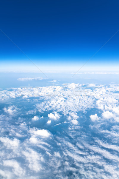 Blue sky high view from airplane clouds shapes Stock photo © Photocrea