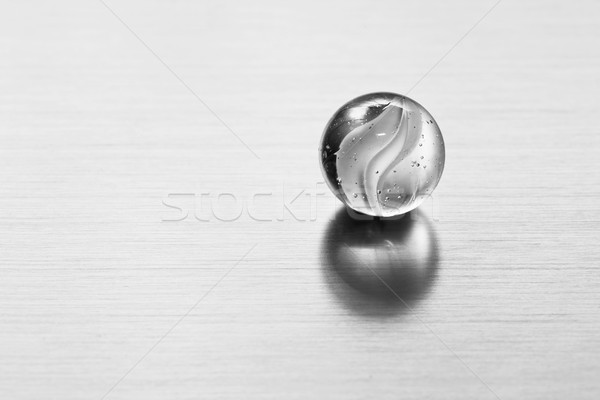 Transparent glass ball on metal surface. Modern background Stock photo © photocreo