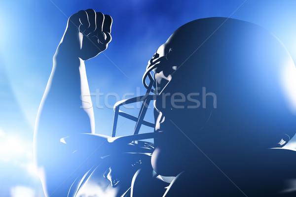 Stock photo: American football player celebrating score and victory.