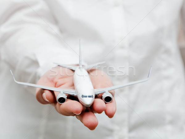 Business person holding airplane model. Transport, aircraft industry, airline Stock photo © photocreo