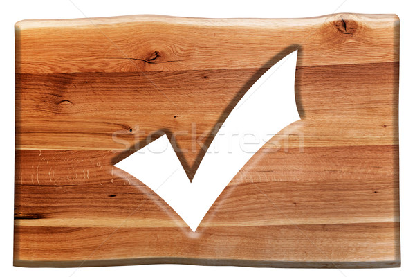 Tick, checking mark symbol cut in wooden board isolated on white Stock photo © photocreo