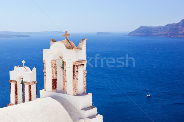 Oia town on Santorini island, Greece. Caldera on Aegean sea. Stock photo © photocreo