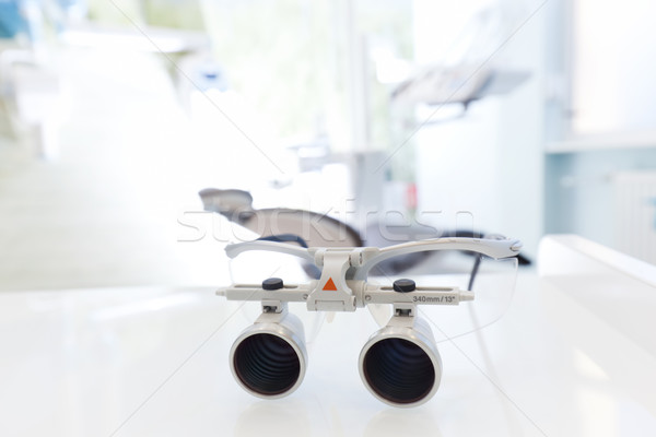 Dentist goggles, protective glasses in dentist's office. Dental loupes. Stock photo © photocreo