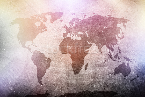World map on grunge concrete wall in colorful spotights.  Stock photo © photocreo