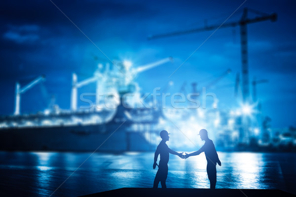 Business handshake in shipyard, shipbuilding company Stock photo © photocreo