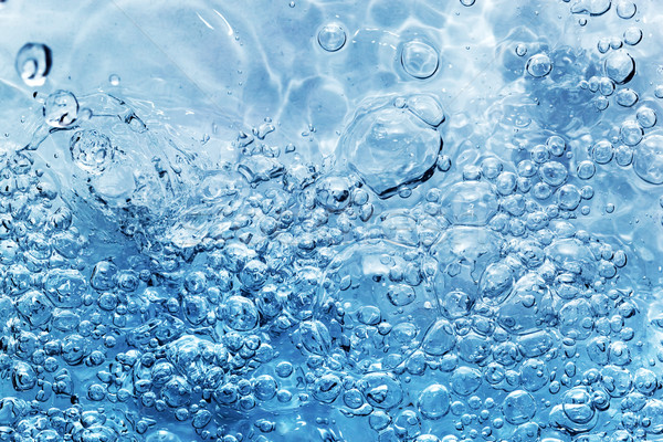 Clean water with bubbles appearing when pouring water or a splash Stock photo © photocreo