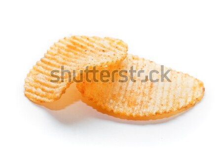 Two spiced potato chips on white background Stock photo © photocreo