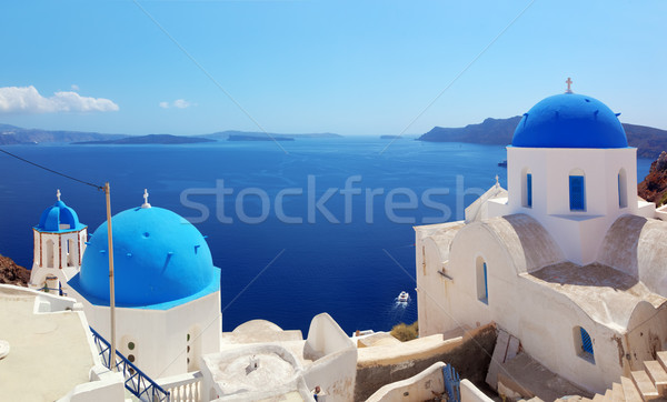 Oia town on Santorini island, Greece. Caldera on Aegean sea. Stock photo © photocreo