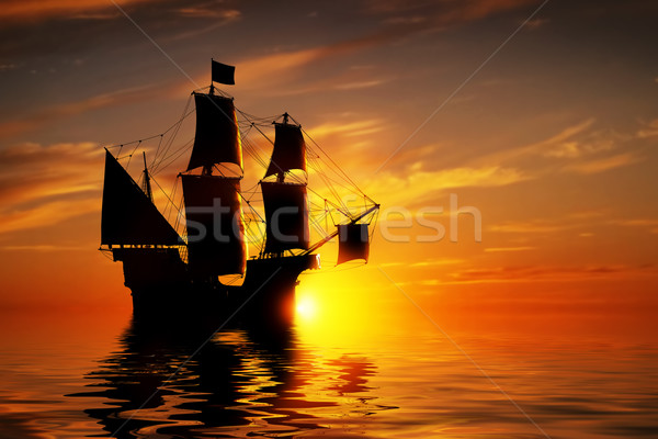 Old ancient pirate ship on peaceful ocean at sunset.  Stock photo © photocreo