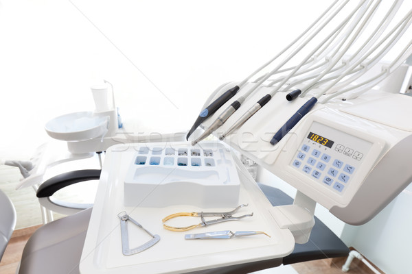 Equipment and dental instruments in dentist's office. Dentistry Stock photo © photocreo