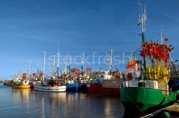 Small ships in a charming harbor Stock photo © photocreo